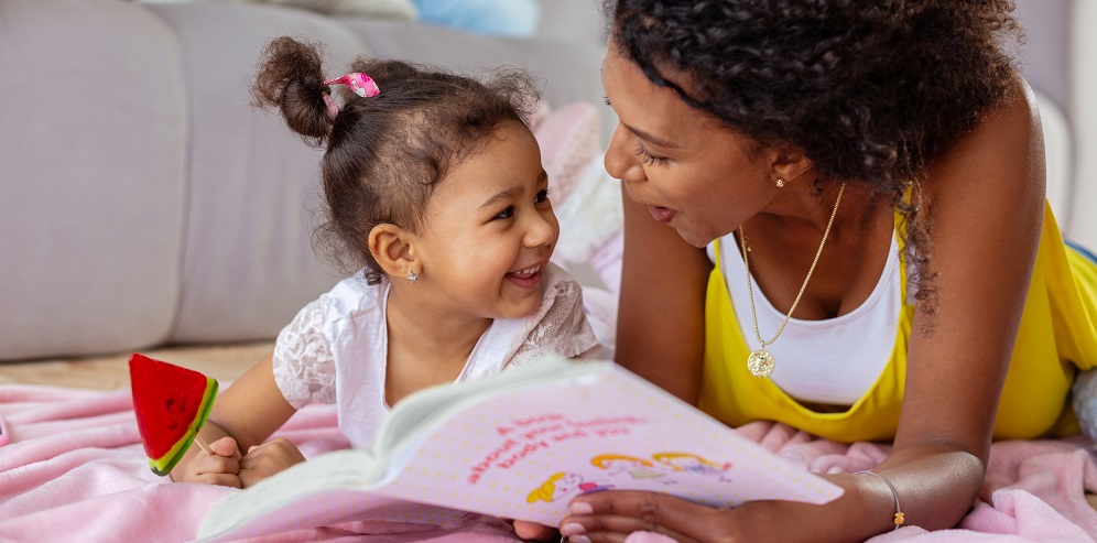 Mother reading to child