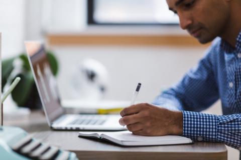 person doing research on computer