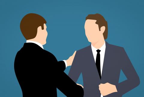 two business people shaking hands