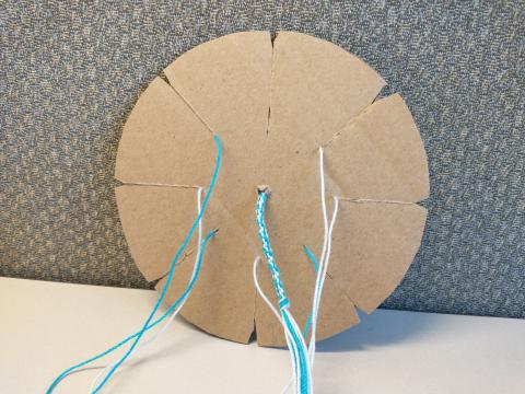 A cardboard loom for making friendship bracelets