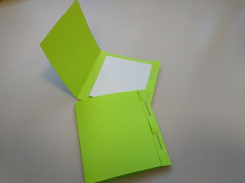 Two matchbook-sized notepads