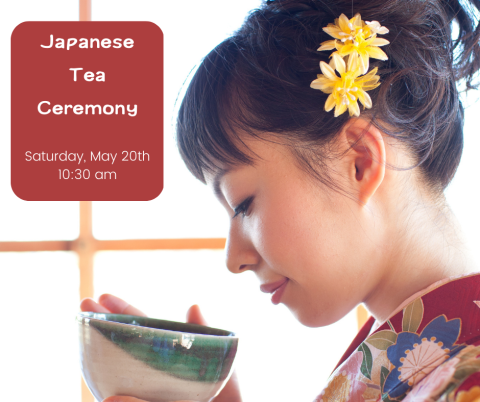 An Asian woman in a kimono holding a cup of tea to her face.