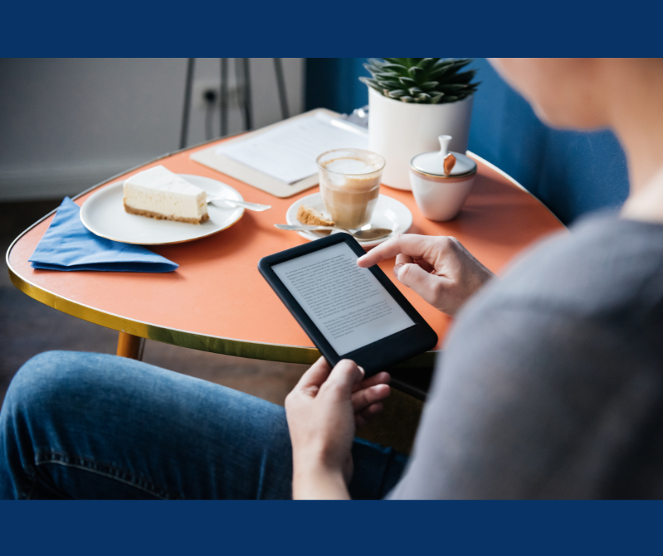 A person reading an eBook at a table