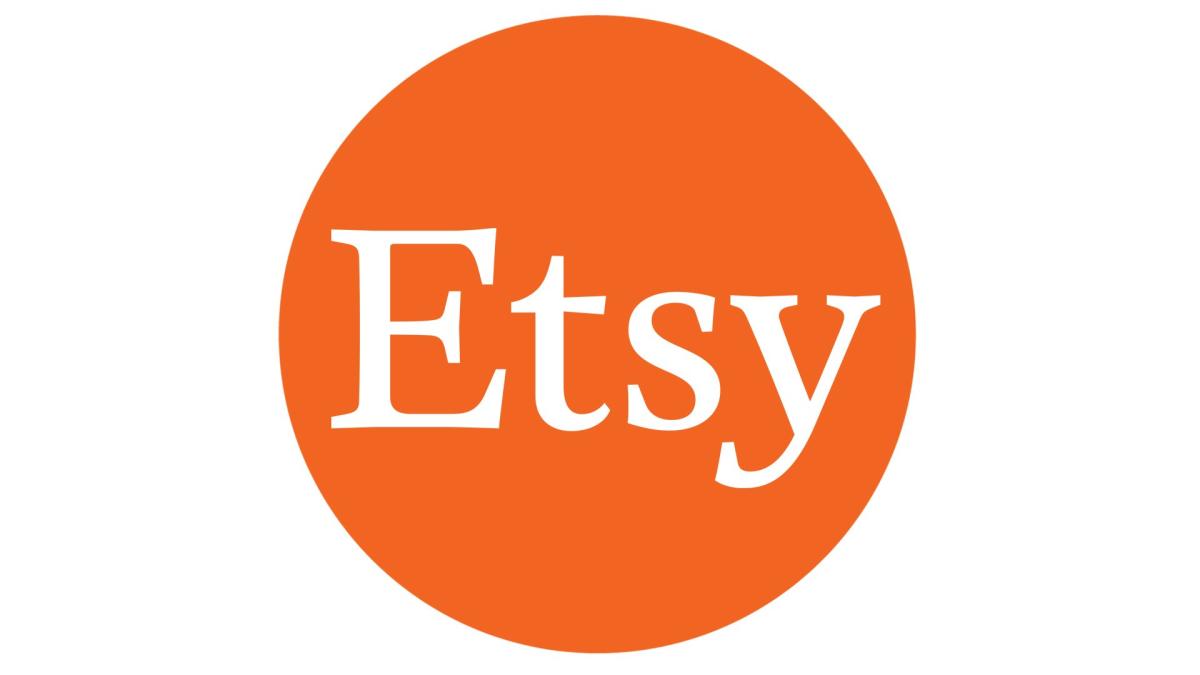 a graphic of the Etsy logo; an orange circle with the word "Etsy" in white 